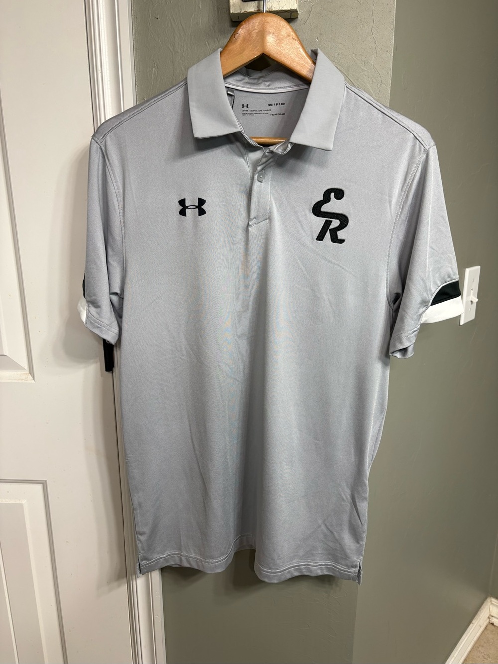 Under Armour Men’s Light Gray Polo with Black Logos